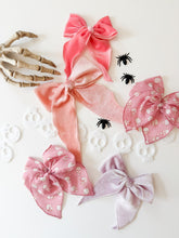 Load image into Gallery viewer, PINK SKELLIES • bow