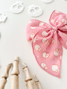 PINK SKELLIES • bow