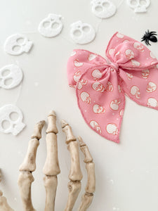 PINK SKELLIES • bow